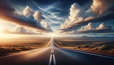 A captivating 4K high-definition image of a long, straight road stretching endlessly towards the horizon, set against a beautiful and expansive landscape under a clear, bright sky